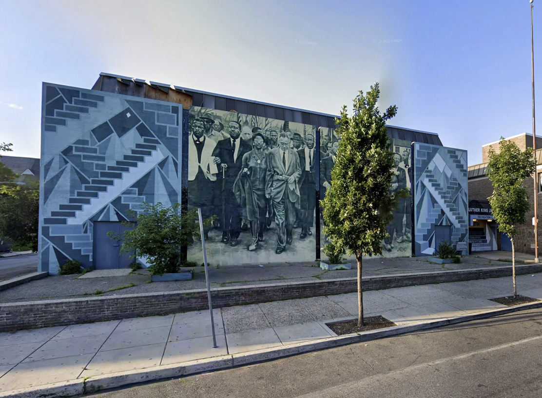 "Staircases and Mountaintops: Ascending Beyond the Dream" by Willis Nomo Humphrey at the Martin Luther King Jr. Rec Center on Cecil B. Moore Avenue in North Philadelphia.