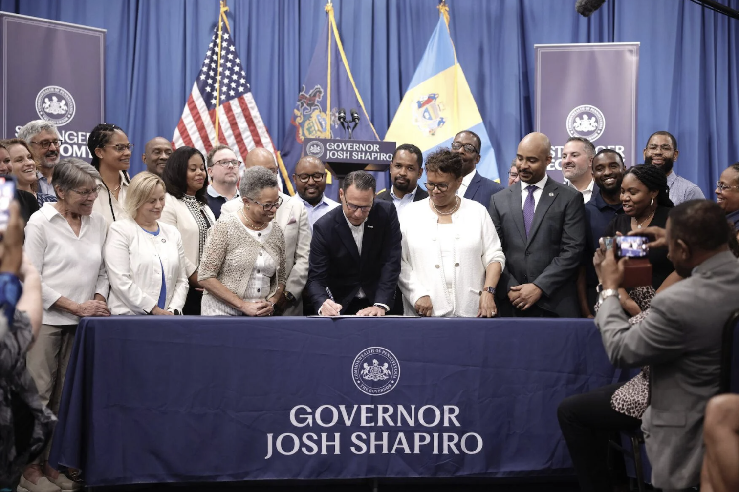 Pennsylvania Gov. Josh Shapiro signs an executive order in Philadelphia on Tuesday, Sept. 5, 2023